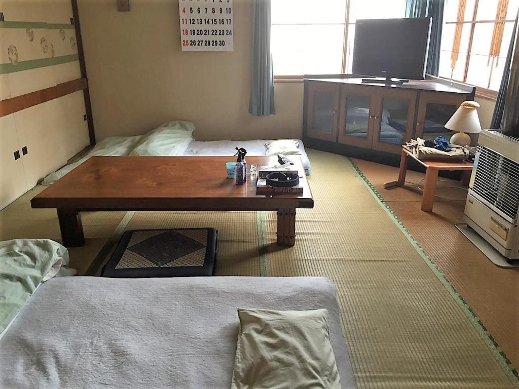 Minshuku Shaman No Sato Hotell Oshamambe Exteriör bild
