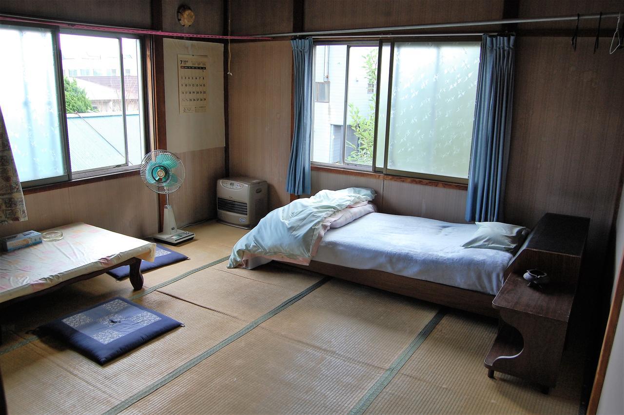 Minshuku Shaman No Sato Hotell Oshamambe Exteriör bild